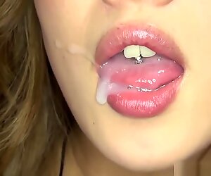Aika sexy model with a tongue ring giving head